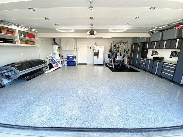 22761 Granite Dome Pl, Canyon Lake, CA 92587 - garage with white refrigerator with ice dispenser and water heater