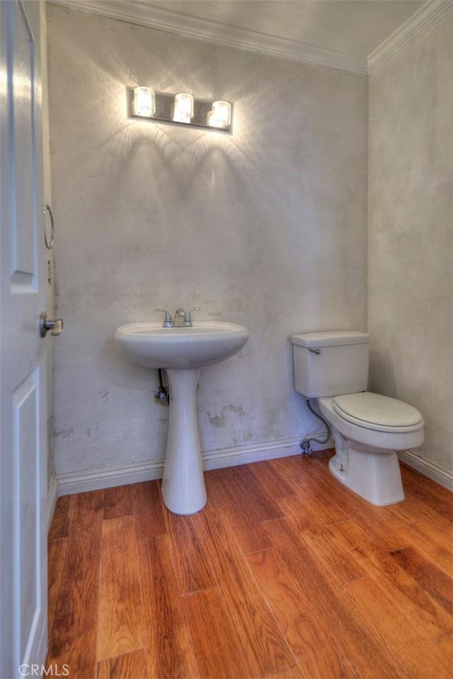 779 W 24th Unit 4, San Pedro, CA 90731 - half bathroom with wood finished floors and crown molding
