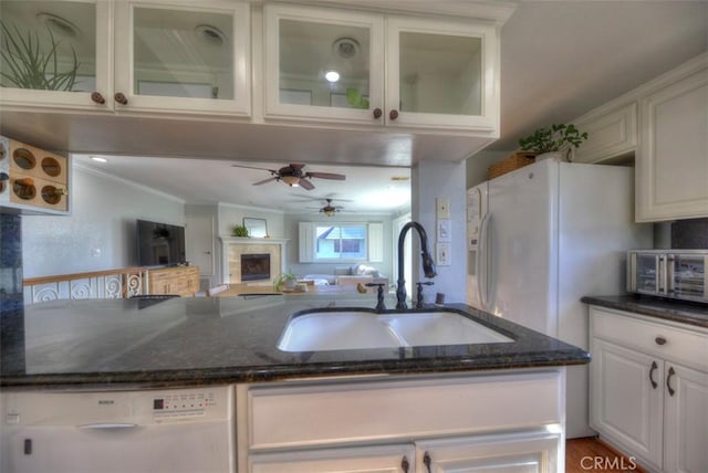 779 W 24th Unit 4, San Pedro, CA 90731 - kitchen with white appliances, ornamental molding, dark stone counters, a ceiling fan, and white cabinetry