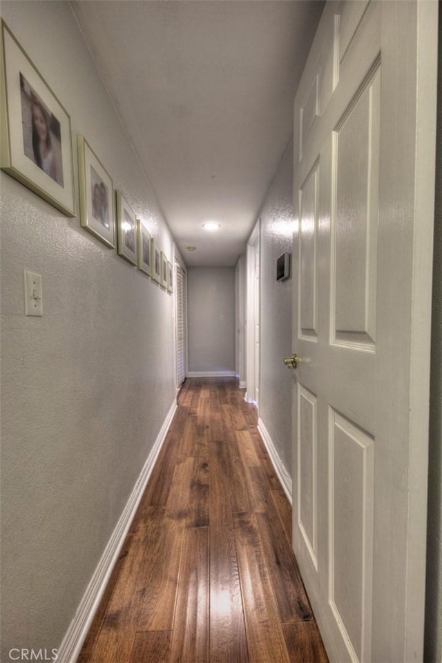 779 W 24th Unit 4, San Pedro, CA 90731 - hallway with dark wood finished floors and baseboards