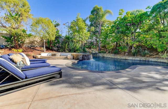 view of pool with a patio