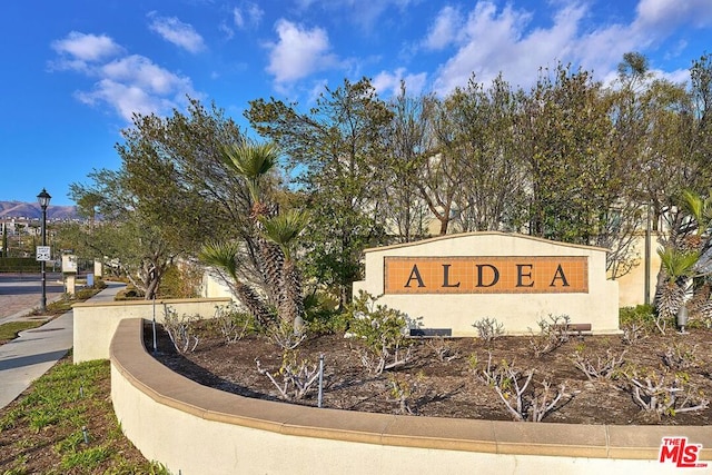 view of community sign