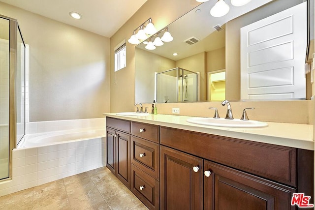 bathroom with plus walk in shower and vanity