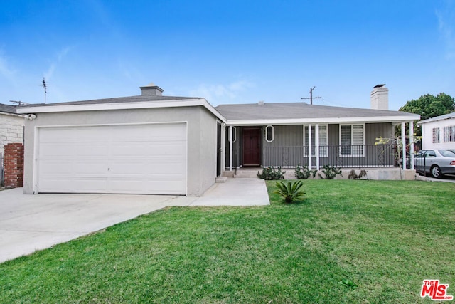 ranch-style house featuring a garage, a front lawn, and a porch