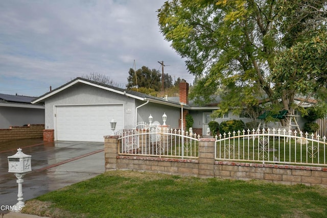 ranch-style home featuring a garage and a front yard