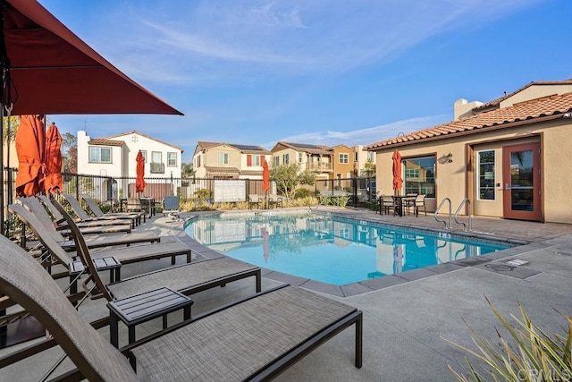 view of swimming pool featuring a patio