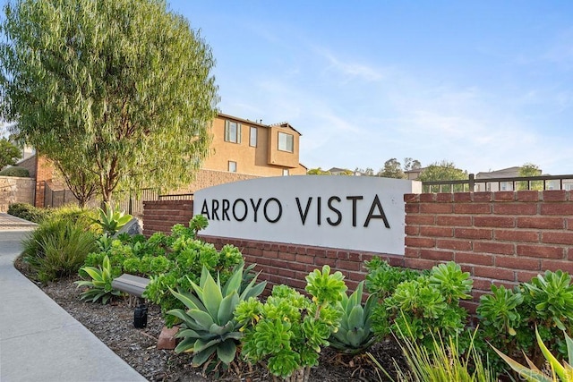 view of community sign