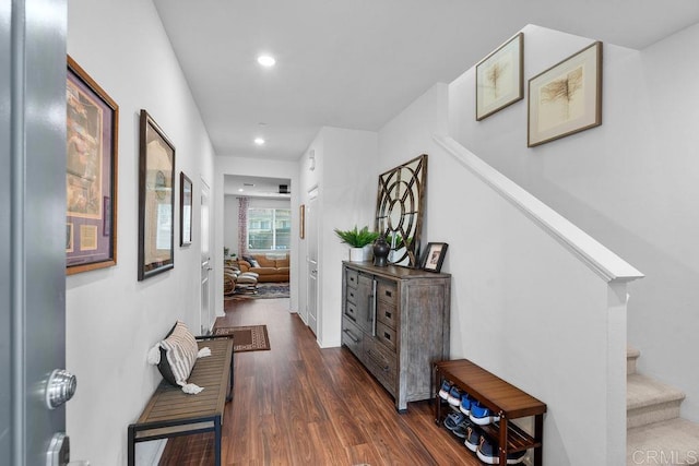 hallway featuring dark wood-type flooring