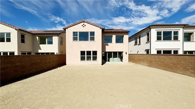 rear view of property with a patio area