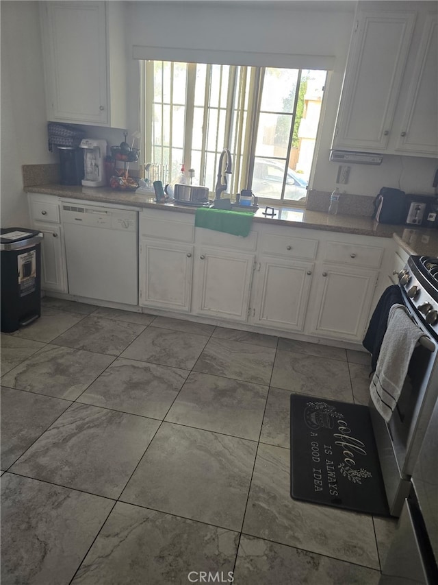 kitchen featuring white cabinetry, dishwasher, gas stove, and stove