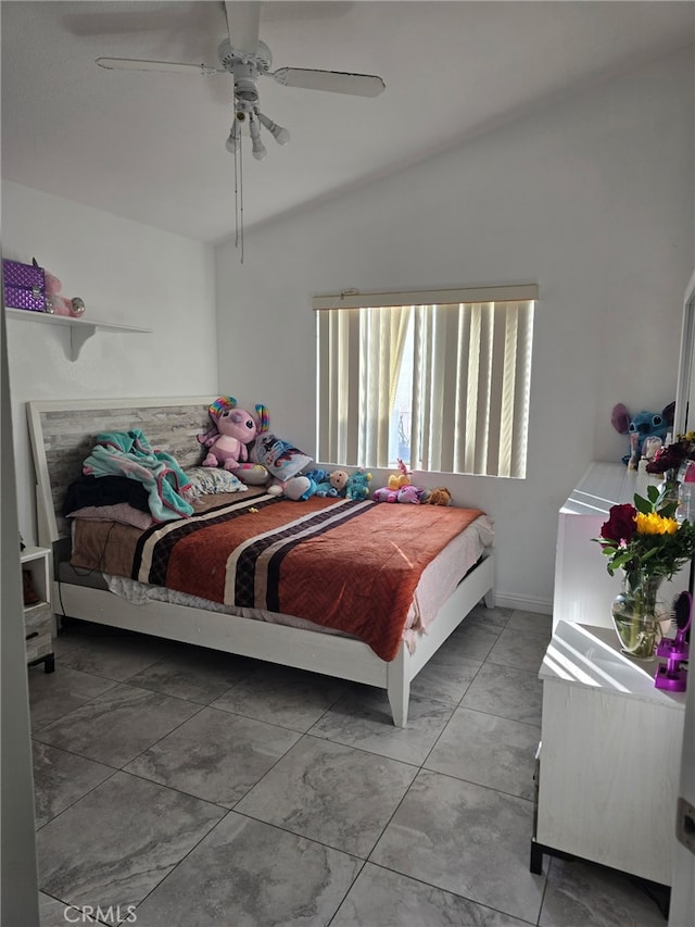 bedroom with vaulted ceiling and ceiling fan