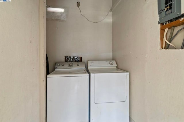 washroom featuring washer and dryer