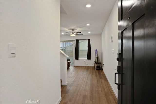 hall featuring hardwood / wood-style flooring