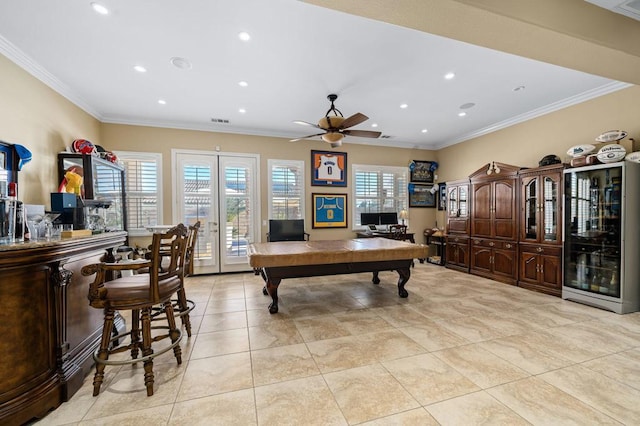 tiled office space featuring french doors, billiards, indoor bar, ornamental molding, and ceiling fan