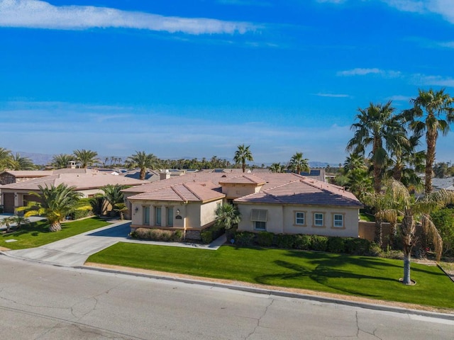 view of front of home with a front yard