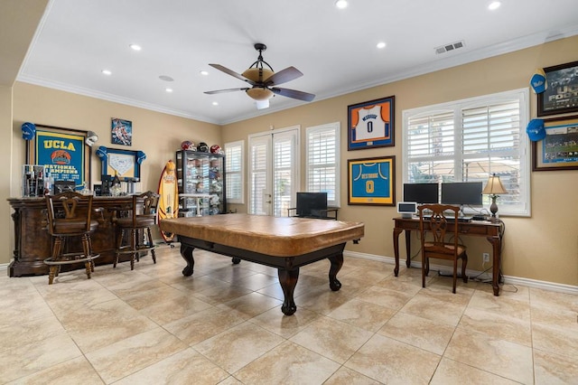 recreation room featuring crown molding, indoor bar, and ceiling fan