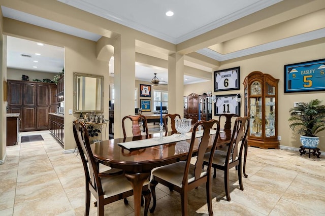 dining space featuring ornamental molding