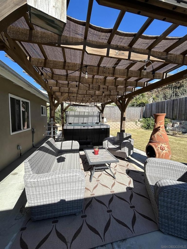 view of patio with outdoor lounge area and a pergola