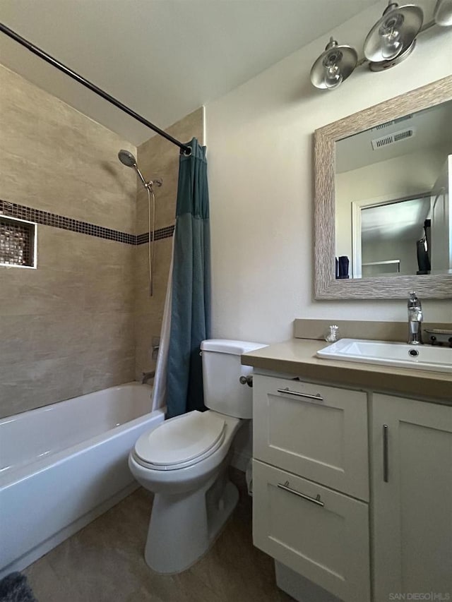 full bathroom with vanity, toilet, and shower / bath combo