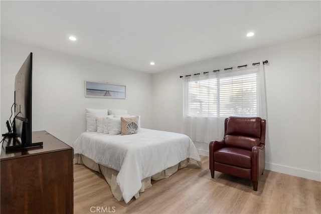 bedroom featuring light hardwood / wood-style flooring