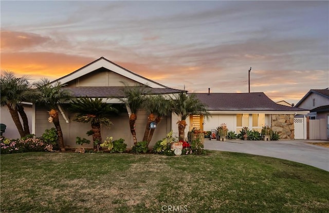 view of front of property with a yard