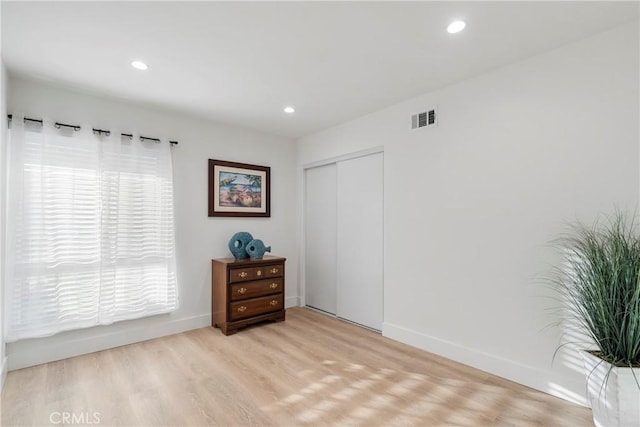 empty room with light wood-type flooring