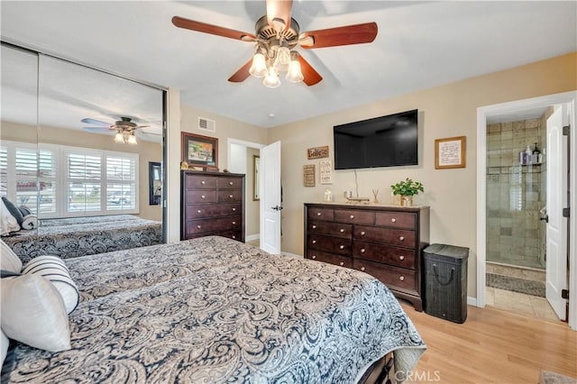 bedroom featuring ceiling fan, light wood-type flooring, and a closet