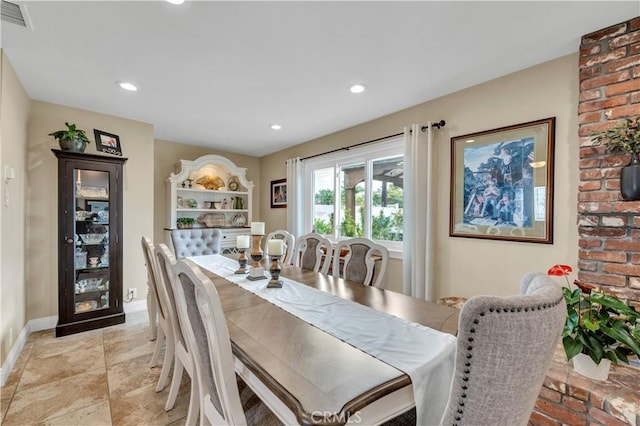 dining space with light tile patterned floors