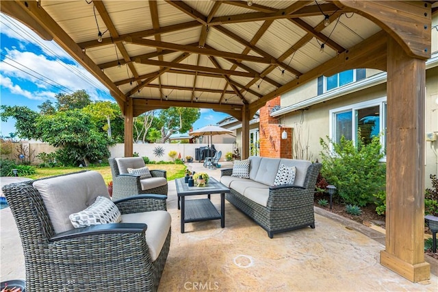 view of patio / terrace featuring a gazebo and an outdoor hangout area