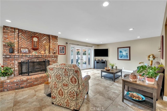 living room with a fireplace and french doors