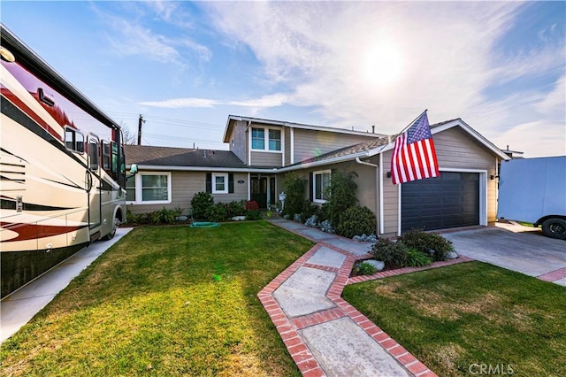 view of property with a garage and a front yard