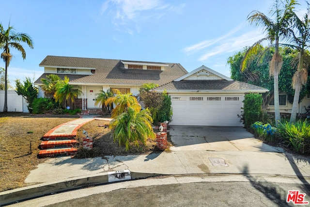 view of front of property featuring a garage