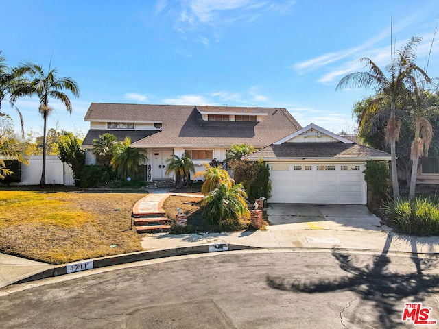 view of front of property featuring a garage