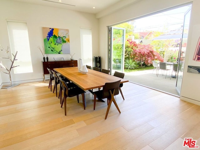 dining room featuring light wood-type flooring