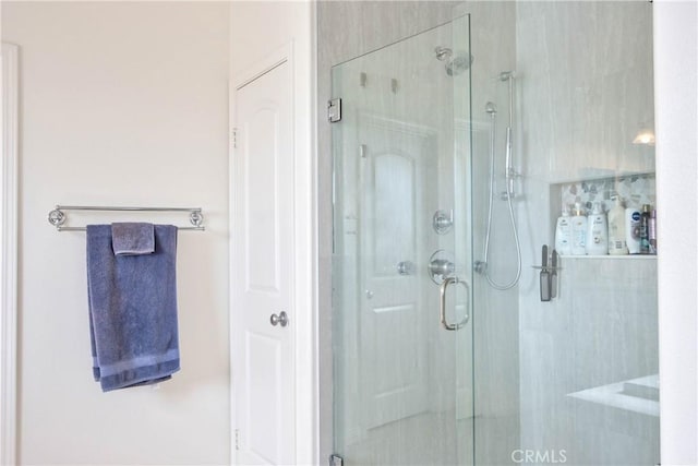 bathroom featuring an enclosed shower