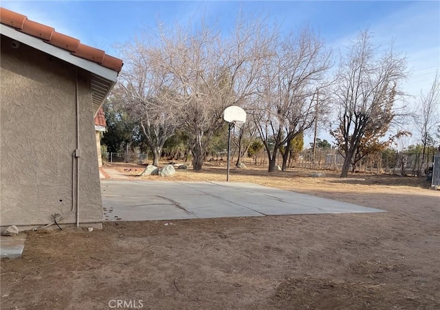 exterior space featuring basketball court