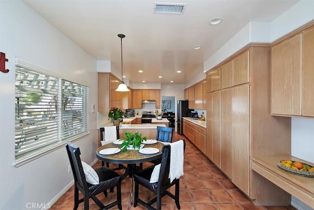 view of tiled dining space