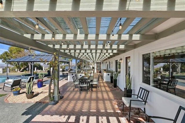 view of patio featuring a pergola