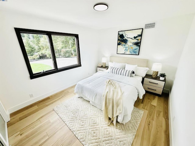 bedroom featuring light hardwood / wood-style flooring