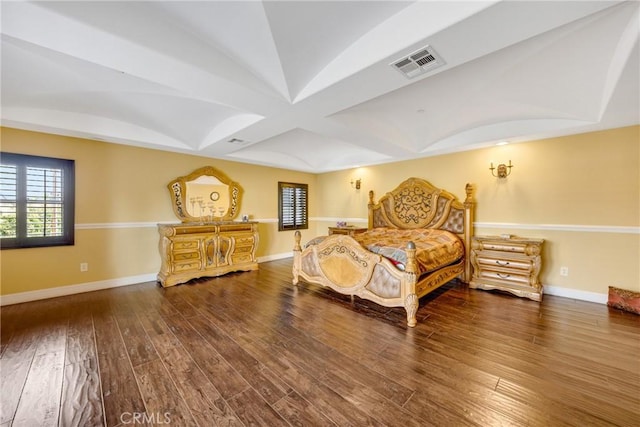 bedroom featuring dark hardwood / wood-style flooring