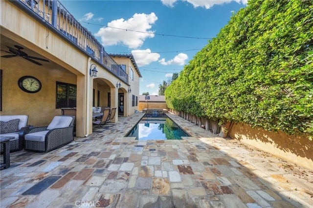 view of swimming pool with a patio