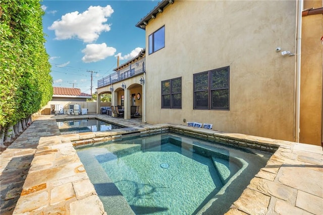 view of pool with a patio area