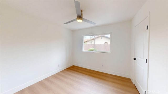 unfurnished bedroom featuring ceiling fan and light hardwood / wood-style floors