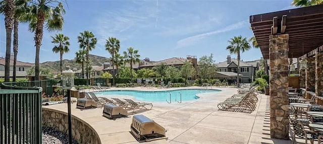 view of pool featuring a patio