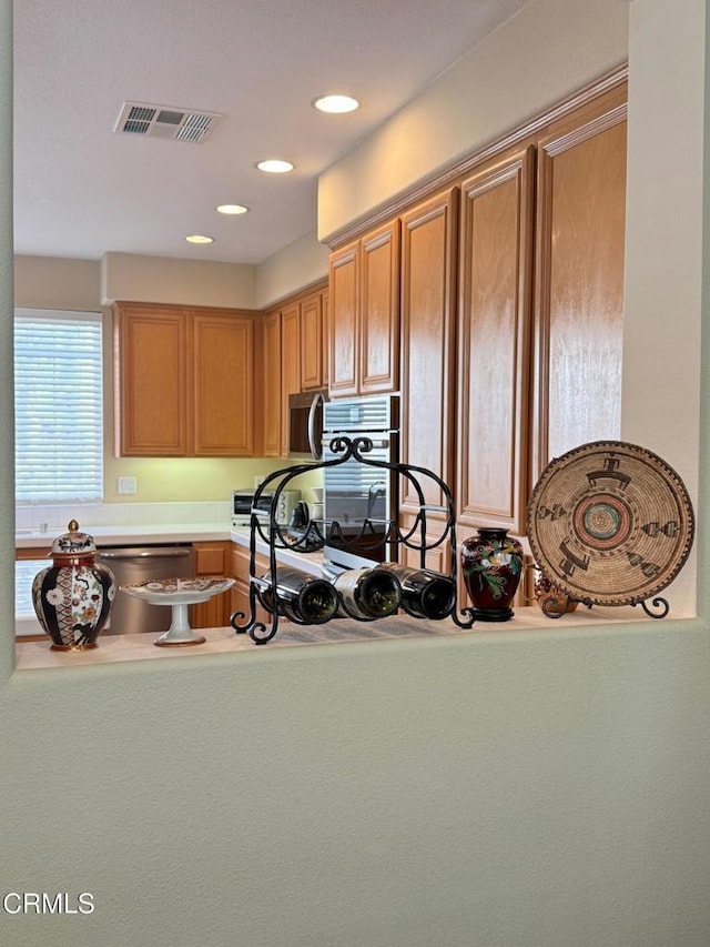 kitchen with stainless steel dishwasher