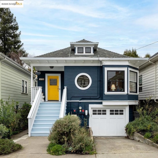 view of front of home with a garage