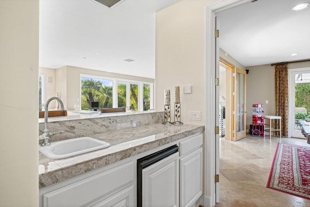 kitchen with sink and white cabinets