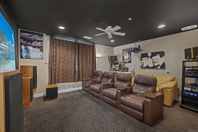 cinema room featuring carpet and ceiling fan