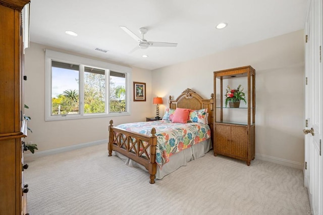 bedroom featuring ceiling fan and light colored carpet