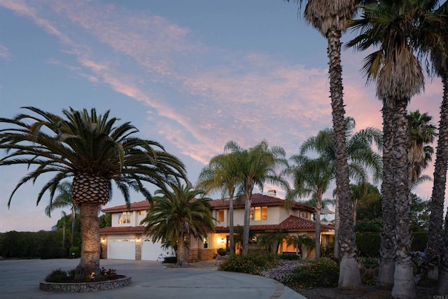 view of front of property with a garage